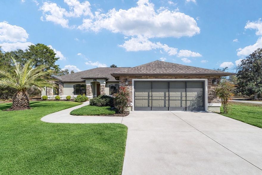 Welcome to this beautifully maintained Triple Crown built home situated on a generous .64-acre parcel on a private cut-de-sac in Ocala Waterway, offering space, privacy, and the kind of Florida lifestyle buyers dream about.  From the moment you arrive, the home’s inviting curb appeal makes a lasting impression. Thoughtfully designed landscaping, mature greenery, and an attractive stone façade create warmth and character that set this property apart.  Step inside to a welcoming tiled foyer that opens into a comfortable, carpeted living room and a versatile flex room — perfect for a home office, playroom, or hobby area. Your eye is immediately drawn through the main living space to the expansive and private backyard, offering peaceful views and room to truly spread out.   The home features spacious bedrooms with ample closet space, creating comfortable retreats for family and guests alike.  In the heart of the home, the kitchen is both functional and inviting, showcasing granite countertops, solid wood cabinetry, and an ample bar space for afternoon gatherings.  The charming breakfast nook has direct access to the screened-in lanai — the perfect spot to enjoy spring mornings with coffee or host relaxed afternoon BBQs with friends. Outside, the large backyard provides endless possibilities — from gardening to gatherings — and includes an oversized shed with RV hookups, ideal for storage, hobbies, or accommodating your recreational lifestyle.  Conveniently located near excellent schools, shopping, medical facilities, and just a short drive to downtown Ocala, this property also offers easy access to nearby nature preserves, camping areas, and bike trailheads. With close proximity to I-75, you’re perfectly positioned for a quick drive to Gainesville UF college football games, Daytona and Ormond Beaches, or Orlando and Tampa theme parks, and major airports.  Space, comfort, and convenience — all wrapped into one exceptional Ocala property.
Come experience easy, relaxed Florida living where privacy meets possibility.