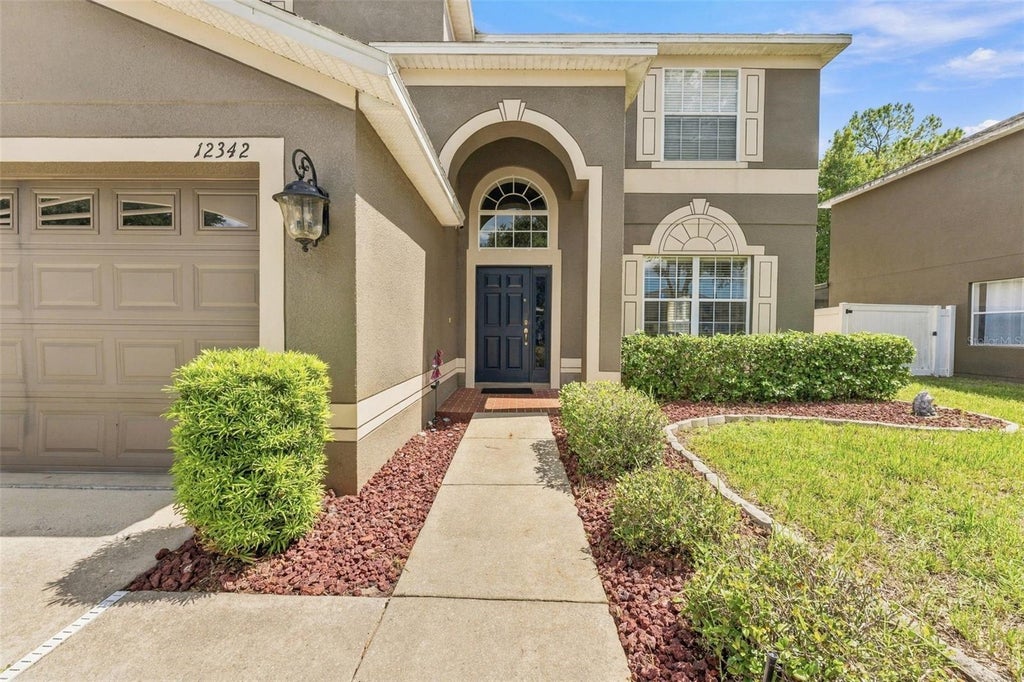 Photo of 12342 Southbridge Terrace, Hudson, FL 34669 (MLS # TB8552869)