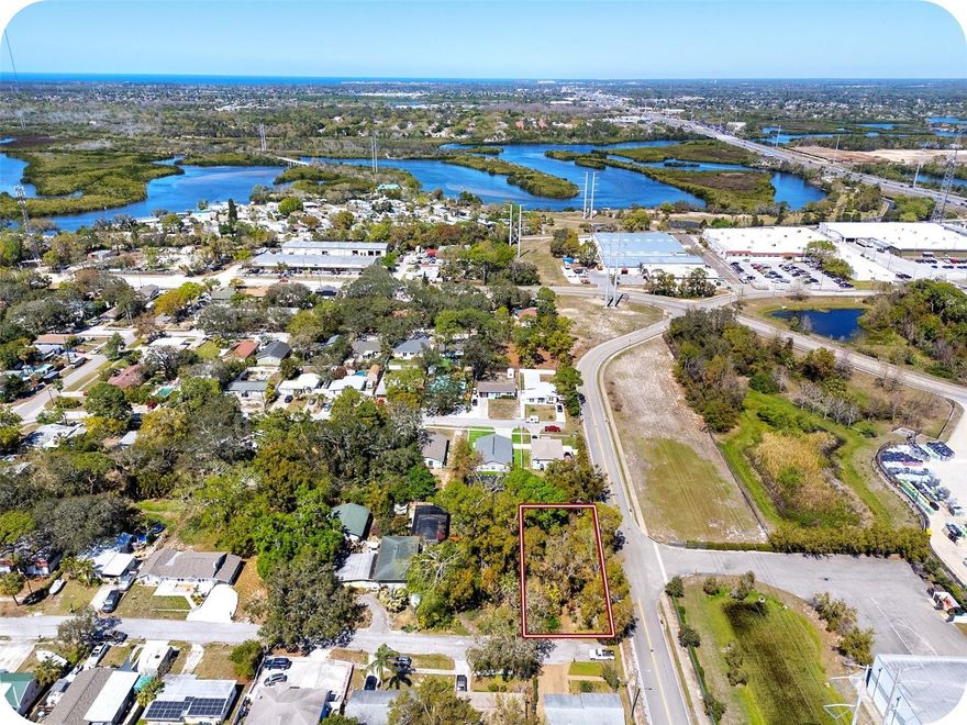 Seize the opportunity to build your dream home on this newly listed 0.193-acre lot in the desirable Fairmount Park community of Tarpon Springs. Offering beautiful views, mature trees, and paved roads, this deep lot provides a peaceful setting while still being conveniently located near everything you need. With potential access to utilities, this property is primed for a quick and easy build.
Ideally situated just minutes from downtown Tarpon Springs, you'll be close to a vibrant selection of shops, waterfront dining, dolphin cruises, and the famous Sponge Docks, where Greek heritage meets coastal charm. Outdoor lovers will appreciate the Pinellas County Trail, just five blocks away, offering miles of scenic biking and walking paths. A short drive takes you to Howard Park, where you can enjoy breathtaking bay views, a dog park, pickleball courts, kayak trails, and a pristine beach. Other nearby outdoor destinations include Highland Nature Park, known for its picturesque boardwalk trails, and Tarpon Springs Splash Park, featuring a maritime-themed splash pad, dog park, and kayak launch. Families will love the Discovery Playground, which offers youth sports programs and recreational fields.
This prime location is also near top-rated schools and St. Petersburg College’s Tarpon Springs Campus, making it a fantastic choice for those looking to build and set down roots or investors looking to develop in a highly coveted area. Don’t miss out on this incredible opportunity—schedule a visit today and start envisioning your future in Fairmount Park!