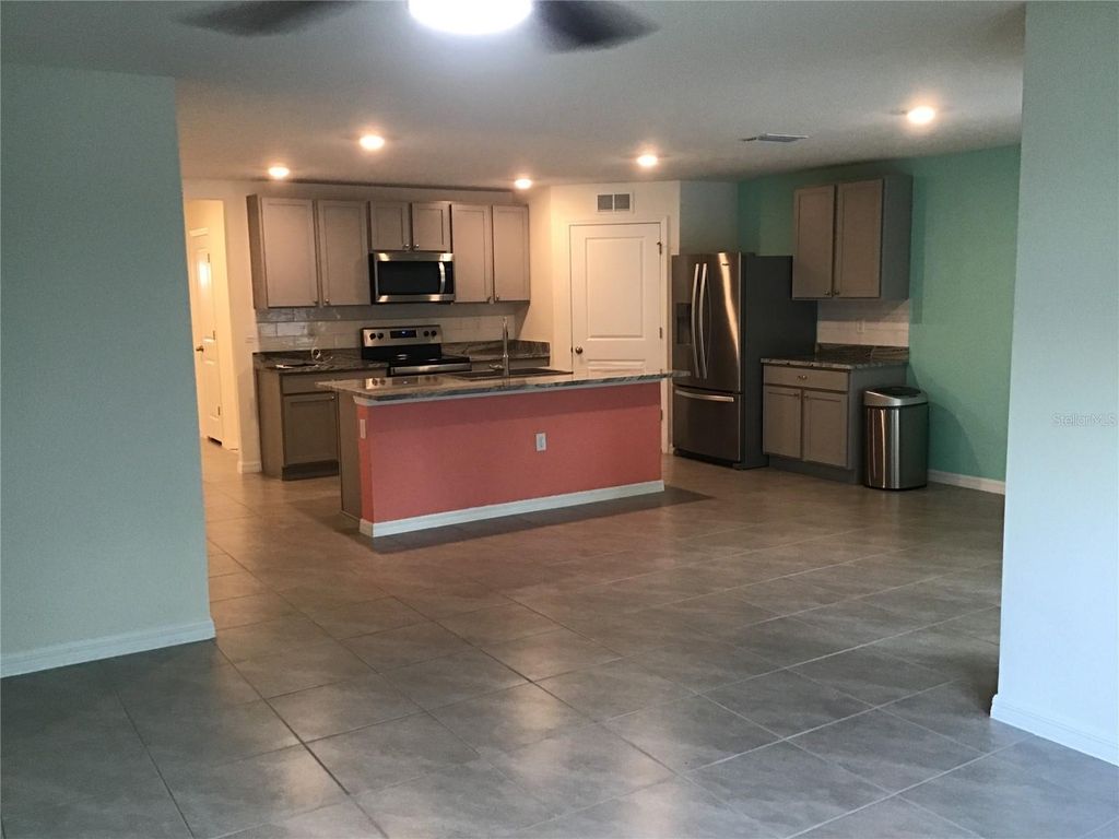 Photo of 7729 Rosewood Garden Loop, Tampa, FL 33637 (MLS # TB8447187)