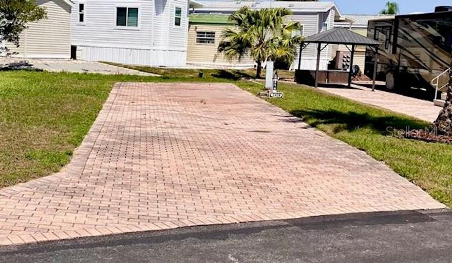 This perfect RV lot is near the pool in the much sought-after Elite Resorts at Citrus Valley. Lot 214 is located near the clubhouse and pool area. It is a spacious lot that has a plenty of room to make it your own piece of paradise. The association allows RV's, sheds, ParkModels with porches and gazebos. A well maintained high quality resort that is only approximately 12 miles from Disney and 13 miles from the quaint downtown Clermont area with weekly farmers markets, food truck events and more. The resort also has two bath houses, laundry facilities, social events and entertainment. This property has the ability for short term rental to either use it part time and rent it the remanding the time or stay full time yourself. Call or email Diana for more information.