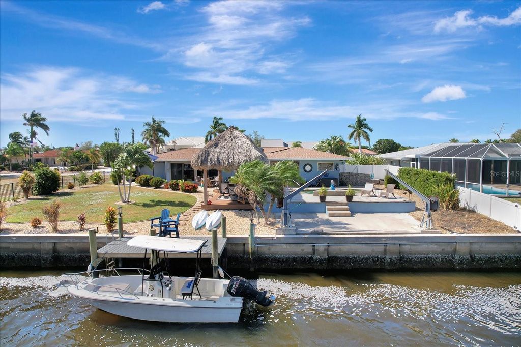 Photo of 158 Morgan Lane SE, Port Charlotte, FL 33952 (MLS # A4665882)