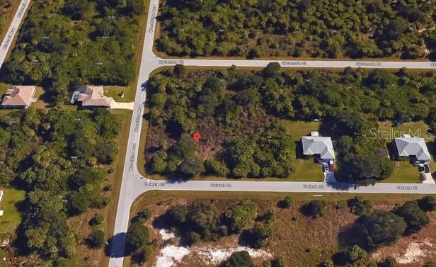 Don’t miss this rare opportunity to own a .48-acre DOUBLE CORNER LOT in a desirable area of Port Charlotte, FL. With residential zoning and plenty of space, this property is ideal for your custom home, additional garage, or expansive outdoor living. Located in a non-flood zone, providing peace of mind and potential savings on insurance. No HOA, no deed restrictions, and close to shopping, dining, schools, medical facilities, I-75, and Gulf Coast beaches. Whether you're looking to build now or invest for the future, this property checks all the boxes!