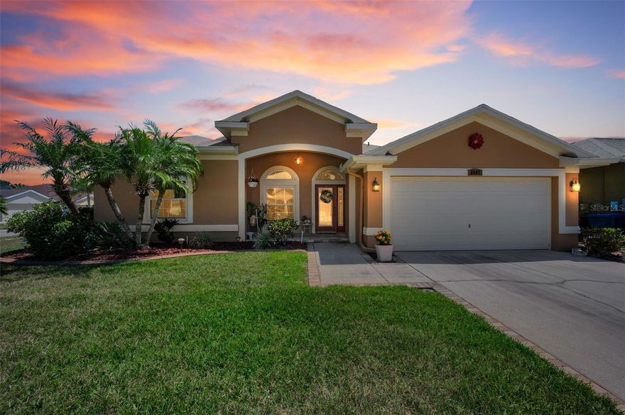 This lovely custom pool home is in the desirable Wild Oaks neighborhood. It is a three-bedroom, two bath, two car garage home. It is situated on a large, landscaped corner lot offering great curb appeal. Step through the beautiful glass front door into the pleasing foyer and take in the wonderful features of this home that include spacious ten-foot ceilings, stylish crown molding, transom windows, wood look tile flooring, and arched doorways. There is a formal dining room at the front of the home with an open doorway to the kitchen that features granite countertops, wood cabinetry, and a breakfast bar. The kitchen is open to the family room and has a wonderful fireplace. There is also a dining area off the kitchen with French doors that lead to the pool / lanai area. The pool area has a screened enclosure with deck space and a covered area, perfect for entertaining friends and family, and the pool features a relaxing waterfall. The back yard is fenced with white vinyl and has easy to maintain landscaping. The spacious primary bedroom offers a walk-in closet and an additional built-in closet; it also has French doors that lead to the pool area. The primary bathroom features a double sink vanity, a bathtub and a separate shower and a water closet for privacy. Off the hallway to the garage entrance is a wonderful laundry room with cabinets for storage. On the opposite side of the home are two additional bedrooms and the hall bath. The roof is three years old and there are some impact-rated windows, and the remaining windows have been treated with hurricane film. Located in central Pinellas County, this gorgeous home is near plenty of shopping, restaurants, banking, and medical services. Tampa international airport is 25 minutes away, Clearwater/St. Petersburg Airport is 15 minutes away, and if you want a beach day, Indian Rocks Beach is only about a 15-minute drive. Your perfect home awaits in Wild Oaks - schedule a private tour today!