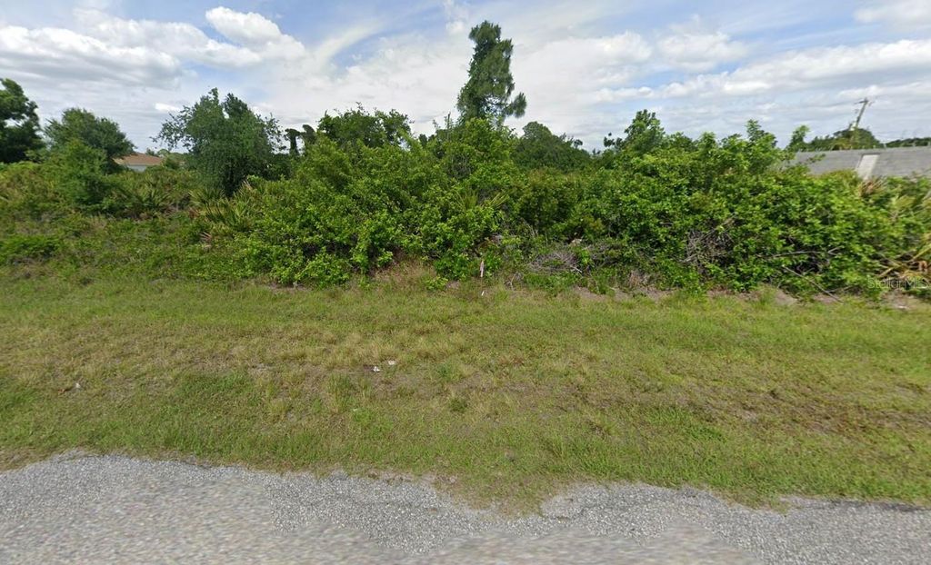 Photo of 5478 Riley Lane, Port Charlotte, FL 33981 (MLS # O6283899)