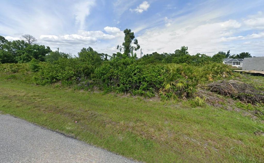 Photo of 5478 Riley Lane, Port Charlotte, FL 33981 (MLS # O6283899)