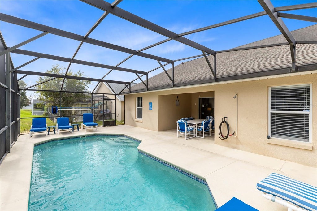 Photo of 154 Pineleaf Pass, Davenport, FL 33897 (MLS # O6447745)
