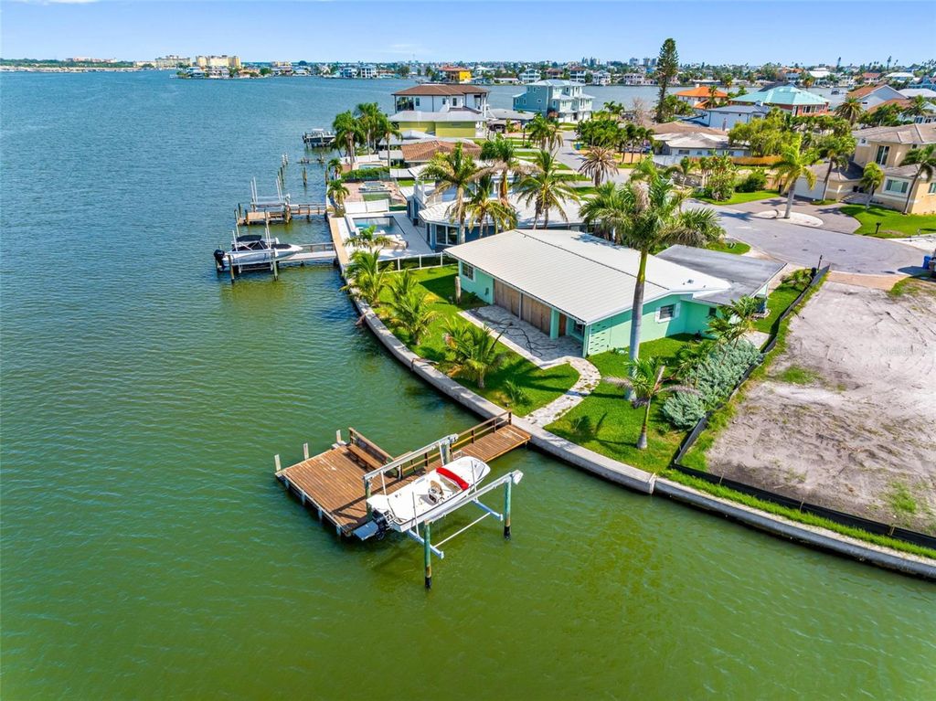 Photo of 493 Bath Club Boulevard N, North Redington Beach, FL 33708 (MLS # TB8423082)