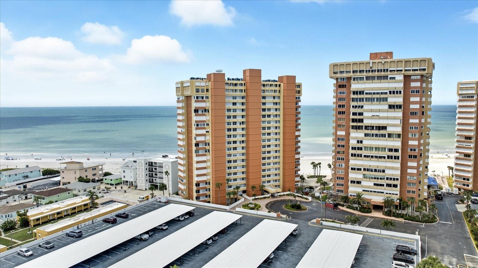 Welcome to your slice of paradise! This beautiful waterfront condo offers everything you need for a carefree coastal lifestyle. Step inside and you’ll immediately appreciate the open, light-filled layout and the expansive balcony, where you can relax with morning coffee or unwind at sunset while taking in the breathtaking water views from the 11th floor. This residence comes fully furnished all the way down to the dishware and linens making it truly move-in ready or ready to rent from day one. The hot water heater was replaced in 2023 and the hurricane shutters ensures peace of mind during storm season. Located in a gated community with 24-hour guard service, residents enjoy resort-style amenities, including a large sparkling swimming pool, private beach access, a reserved covered parking spot, EV charging stations, and BBQ facilities. The community is currently being renovated to include a state-of-the-art fitness center, library, card rooms, beachside clubhouse, and billiards. In May 2025 the exterior was completely painted with balcony and walkway waterproofing. The condo has also been successfully used as a monthly rental over the past five years. This is not only a wonderful beach retreat but also a smart investment opportunity. Whether you plan to live here full-time, enjoy it as a vacation home, or have an income producing property, this condo checks all the boxes. This condo is convenient to shops, restaurants, bars and parks.