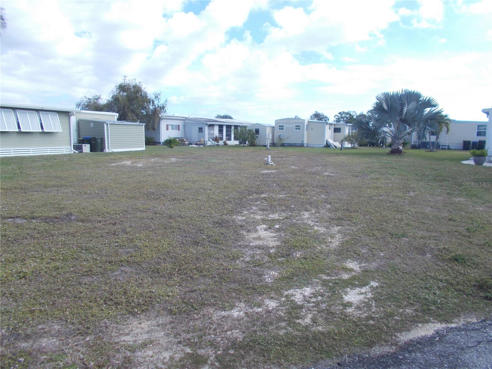 VACANT LAND in the sought after Gated Community of Holiday Park and in the Pet Section. The land is located on Kilohee Court, in the cul-de-sac and is 6100 square feet. In Holiday Park you own the land with a deed and the maintenance fee $2340.00 a year ($195.00 a month) is included in your taxes. Holiday Park offer many amenities including 2 Pools, Tennis Courts, Pickle Ball, Bocci, Shuffleboard, Laundry Library, Horseshoes, Bingo plus other card games, Fitness Room and so much more. This home has been pulled off and electric and water are in place. This is a perfect place for your new manufactured home. Come and see!