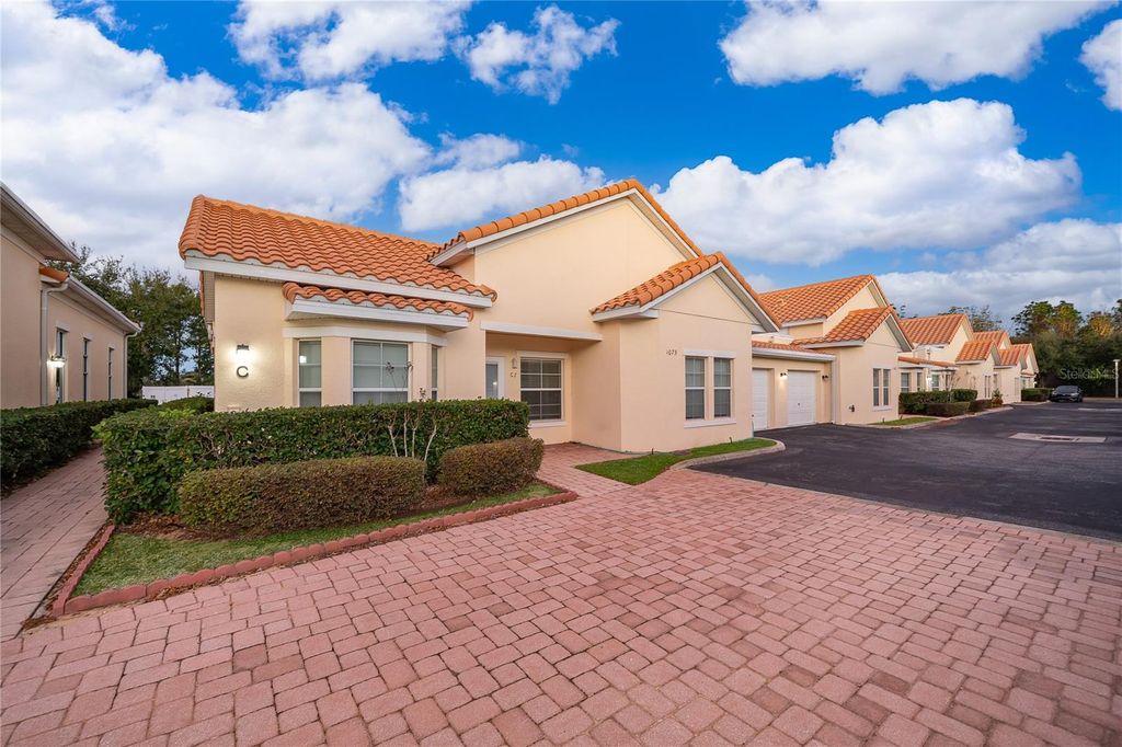 Photo of 1075 David Walker Drive #C-1, Tavares, FL 32778 (MLS # O6400906)