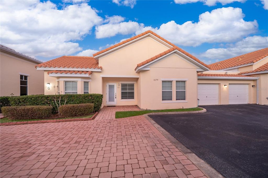 Photo of 1075 David Walker Drive #C-1, Tavares, FL 32778 (MLS # O6400906)