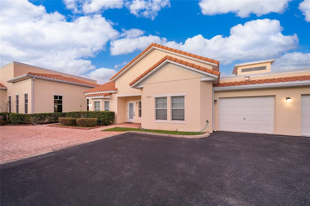 Photo of 1075 David Walker Drive #C-1, Tavares, FL 32778 (MLS # O6400906)