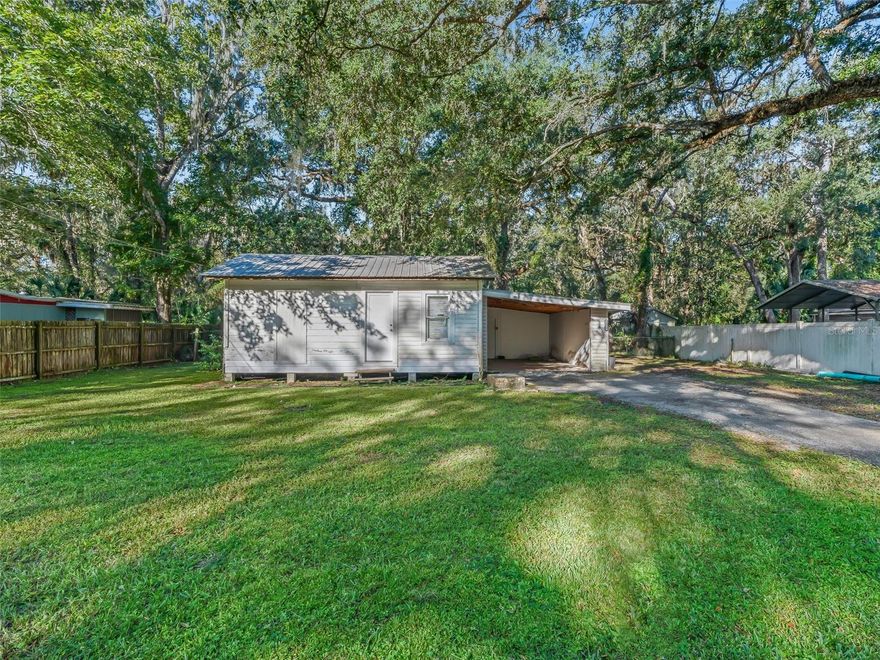 This cozy home offers everything you need for comfortable Florida living. Enjoy the privacy of a fully fenced yard, perfect for pets, gardening, or entertaining. The property features a convenient carport for covered parking, a laundry room, and storage. A metal roof and French doors that open to the backyard for a seamless indoor-outdoor experience. Ideally located just minutes from I-75, Hwy 44, and the Florida Turnpike, you’ll have easy access to Tampa, Orlando, Ocala, and The Villages. Outdoor enthusiasts will love nearby Lake Panasoffkee and the Withlacoochee River, which offer excellent opportunities for fishing, boating, and recreation. This property has strong potential as a long-term rental or vacation home, an ideal addition to any real estate portfolio. Schedule your showing today and discover the possibilities this home has to offer!