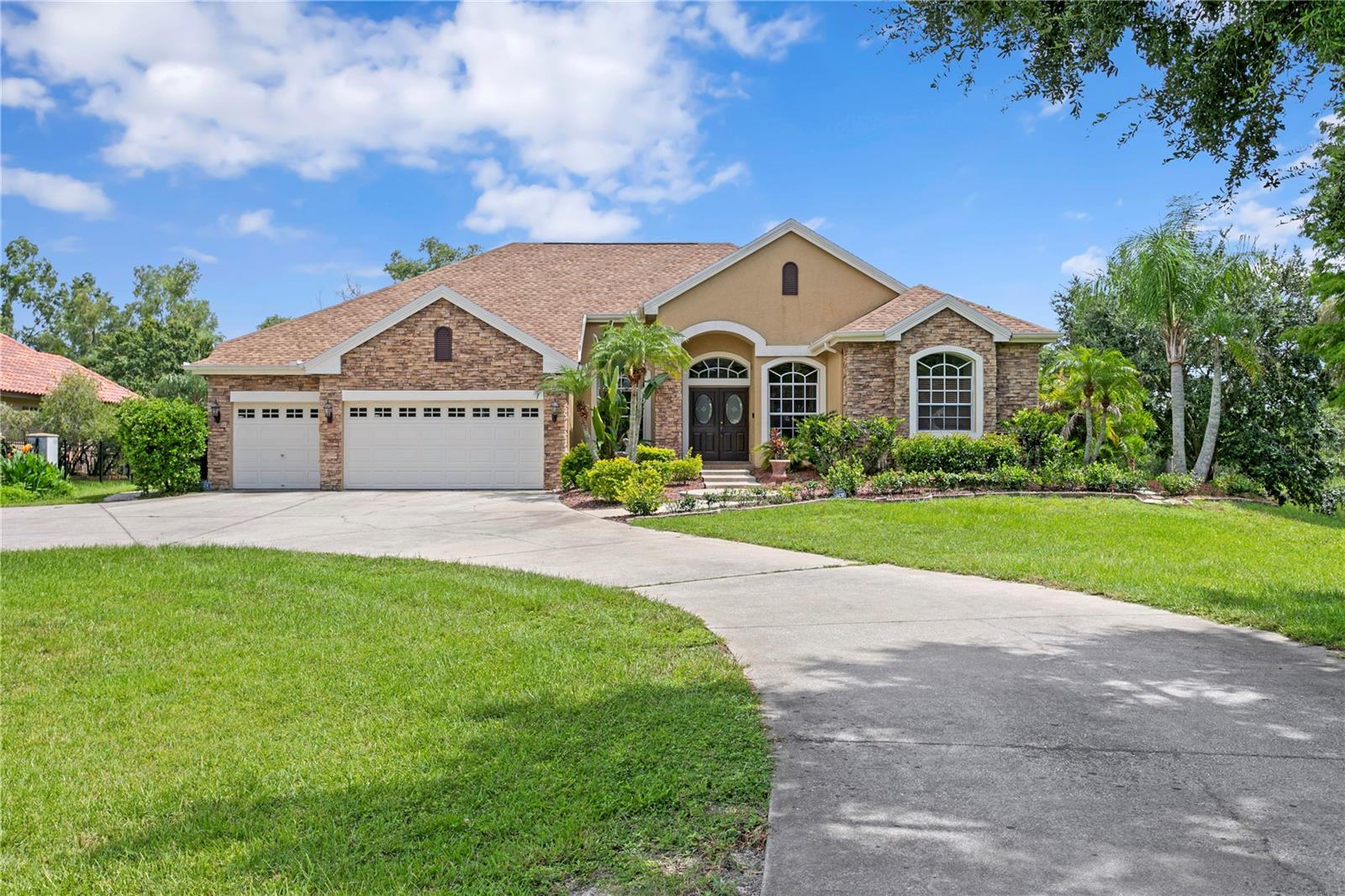 Spectacular One-Story Pool Home on 1.37 Acres in Twin Branch Acres
Welcome to this fantastic Nohl Crest Carrington home, beautifully positioned on a spectacular 1.37-acre pond-view homesite in the sought-after equestrian community of Twin Branch Acres. From the lush landscaping and stone accents on the exterior to the gorgeous custom tile inserts in the foyer, this home exudes warmth and elegance from the moment you arrive. Bring your pets.
Inside, Multiple sliding doors and windows allow picturesque views of the sparkling pool, seamlessly connecting indoor and outdoor living. The gourmet island kitchen is a chef’s dream, featuring a Kenmore Elite cooktop, built-in wall oven and microwave, Corian counters with an integrated sink, and an abundance of staggered cabinetry with crown molding for all your storage needs.
The open floor plan offers generous living and dining spaces, perfect for gatherings and everyday comfort. All four bedrooms are spacious with ample closet space, while the primary suite serves as a private retreat, featuring dual walk-in closets, plant shelves, and a cozy sitting room ideal for a home office or reading nook. The primary bath offers dual vanities, a jacuzzi tub, and a separate shower for a spa-like experience at home.
Step outside to your oversized screened lanai and take in the expansive views while enjoying your spectacular free-form inground pool, perfect for relaxing Florida days. The enormous deck area provides ample room for entertaining, with a covered area ideal for a wonderful outdoor dining experience for relaxing Florida days and nights. The 6+ person jetted jacuzzi spa is a perfect place to unwind and take in the backyard gorgeous sun sets and water views. Bring your fishing poles, golf clubs and Volleyball nets this expansive backyard gives everyone a place to play.
Additional features include block construction, dual-zone surround sound, gutters, 3M window tint throughout, and an indoor laundry room for added convenience.
Homes like this, with acreage and serene pond views in Twin Branch Acres, rarely come to market.
Come See the Difference Quality—and Love—Makes.
12532 Twin Branch Acres Rd isn’t comparable. It’s incomparable.
