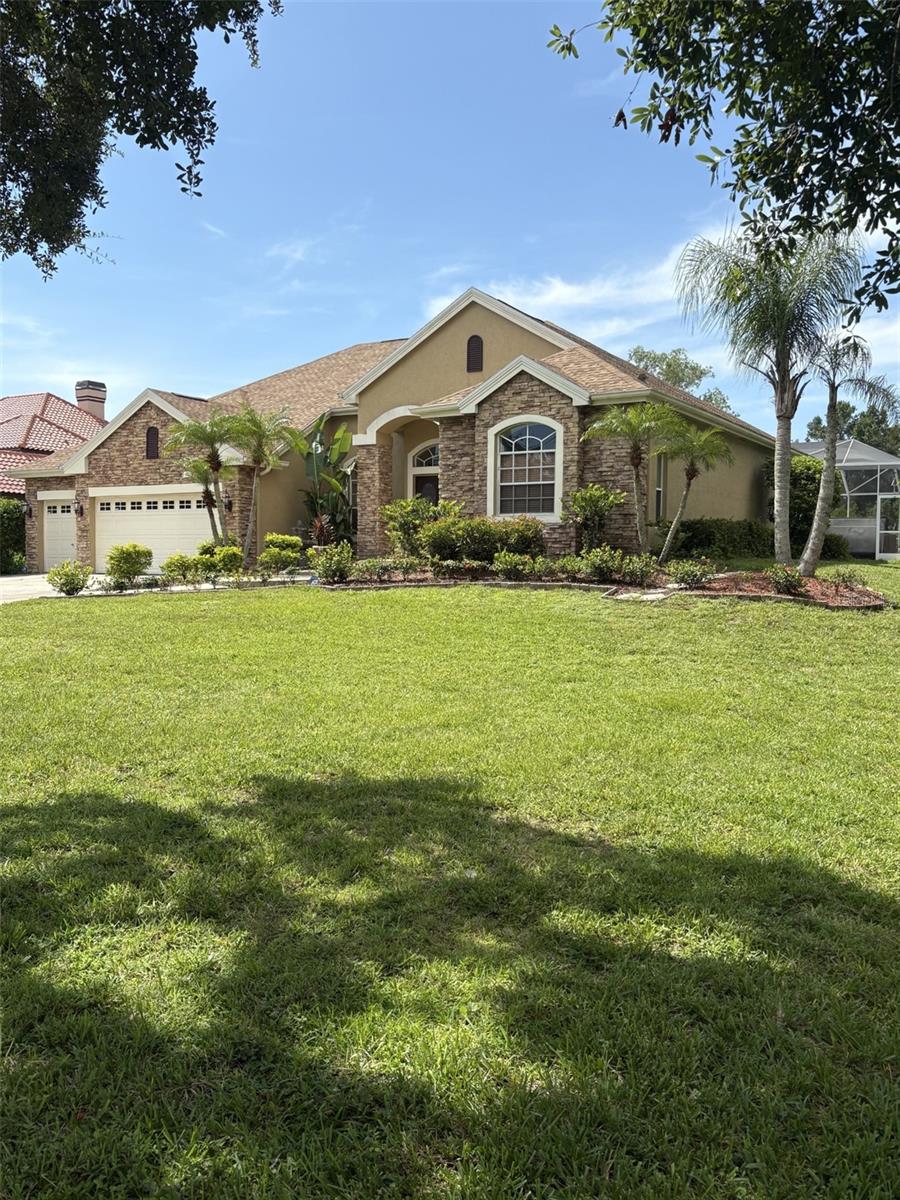 Professional interior photos coming 7/19/25
Spectacular One-Story Pool Home on 1.37 Acres in Twin Branch Acres
Welcome to this fantastic Nohl Crest Carrington home, beautifully positioned on a spectacular 1.37-acre pond-view homesite in the sought-after equestrian community of Twin Branch Acres. From the lush landscaping and stone accents on the exterior to the gorgeous custom tile inserts in the foyer, this home exudes warmth and elegance from the moment you arrive. Bring your pets, voluntary HOA only.
Inside, Multiple sliding doors and windows allow picturesque views of the sparkling pool, seamlessly connecting indoor and outdoor living. The gourmet island kitchen is a chef’s dream, featuring a Kenmore Elite cooktop, built-in wall oven and microwave, Corian counters with an integrated sink, and an abundance of staggered cabinetry with crown molding for all your storage needs.
The open floor plan offers generous living and dining spaces, perfect for gatherings and everyday comfort. All four bedrooms are spacious with ample closet space, while the primary suite serves as a private retreat, featuring dual walk-in closets, plant shelves, and a cozy sitting room ideal for a home office or reading nook. The primary bath offers dual vanities, a jacuzzi tub, and a separate shower for a spa-like experience at home.
Step outside to your oversized screened lanai and take in the expansive views while enjoying your spectacular free-form inground pool, perfect for relaxing Florida days. The enormous deck area provides ample room for entertaining, with a covered area ideal for a wonderful outdoor dining experience for relaxing Florida days and nights. The 6+ person jetted jacuzzi spa is a perfect place to unwind and take in the backyard gorgeous sun sets and water views. Bring your fishing poles, golf clubs and Volleyball nets this expansive backyard gives everyone a place to play.
Additional features include block construction, dual-zone surround sound, gutters, 3M window tint throughout, and an indoor laundry room for added convenience.
Homes like this, with acreage and serene pond views in Twin Branch Acres, rarely come to market.
Come See the Difference Quality—and Love—Makes.
12532 Twin Branch Acres Rd isn’t comparable. It’s incomparable.