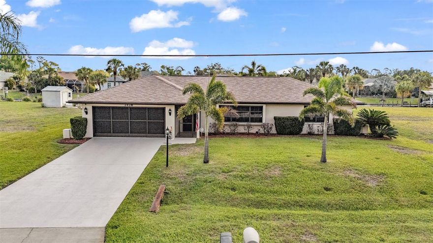 Waterfront pool home with 10,000 lb boat lift, seawall, and extensive dock with electric already in place! This well-maintained property offers canal frontage with access toward the Gulf, ideal for boating and enjoying the Florida lifestyle. The dock setup includes walk planks and an engine service platform, providing added convenience for boat owners.

The home features a heated pool with a pavered pool deck, creating a great outdoor living space surrounded by meticulously maintained, Florida-style landscaping. Inside, the property has been seasonally used, never rented, and carefully maintained over time. The layout includes a primary bedroom, a secondary bedroom, and an additional approximately 250 sq ft bedroom space that could function as a guest suite, en suite-style setup, or flexible living area—offering a true three-bedroom configuration with added versatility.

City water services the home, with a separate well dedicated for irrigation. The driveway has been resurfaced, and overall pride of ownership is evident throughout.

Optional opportunities include a double lot to the left and a separate single lot to the right, both available for purchase independently. Turnkey furnishing package may be available separately.