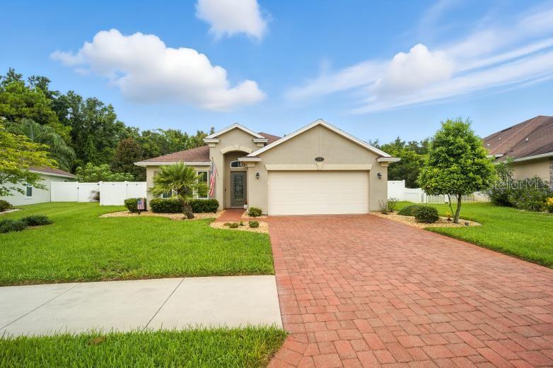 Welcome to this spacious 3-bedroom, 2-bath, 2 car garage home with a versatile flex room, perfect for a home office or playroom. Nested in the beautiful single family community called Hidden Lakes with shining blue lakes & verdant conservation areas. Luxury homes with lots of charm is what this community is all about. Underground utilities is a plus.This home offers over 1,900 sq. ft. of living space and built in 2015, the property comes with a transferable termite bond for added peace of mind. HOA fees are drastically lower compared to other choices in the aera.
And NO CDD! Tile & Carpet floors thoughtout, Nice Paver Driveway. The sellers have taken spectacular care of their home and know the buyer will turly enjoy the home as much as they have.
The gourmet kitchen features Granite/Quartz countertops, stainless steel appliances, and an open layout with Kitchen overlooking the family room — ideal for entertaining and everyday living. The primary suite boasts a double step tray ceiling and generous space for relaxation. Double sinks and walk-in shower and oversize walk-in closet.
Step outside to your covered and screened lanai, perfect for year-round enjoyment. The backyard is fully fenced with light color vinyl fencing & lots of attached solor lights that create a relaxing environment. Home backs up to a conservation area, providing privacy and serene views with no rear neighbors.
The standout amenities starting with a Resort Style Pool & Community Center, playground, sidewalks, streetlights and tennis court, as well as hiking on the natural trails. Outside the community are lots of bike trails all over the Palm Coast area. The convenience of the area is: The major Airports are within an hour away, nearby grocery shopping, a quick drive to the beautiful shores of Flagler Beach where you will find lots of fun restaurants, unique shopping and entertaining and fishing. Don't forget to watch the sun rise in the early am and the amazing moon rises. *** 35 mins north to the Oldest City of the United State (Saint Augustine) and south is Daytona Beach and Ormond Beach. Hospital and Doctors offices are very close as well. Come and live the Florida lifestyle and make your life simple.