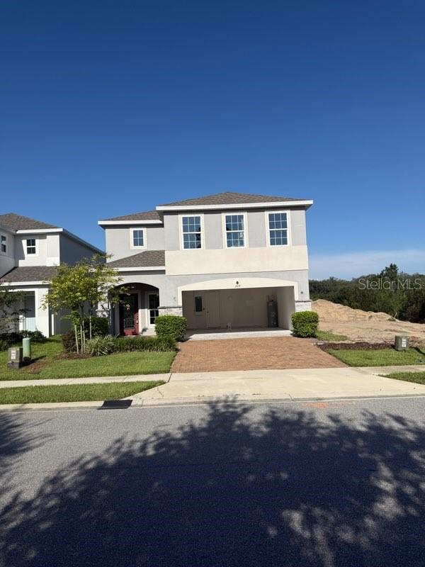 Photo of 309 Preserve Pointe Boulevard, Davenport, FL 33837 (MLS # O6437220)