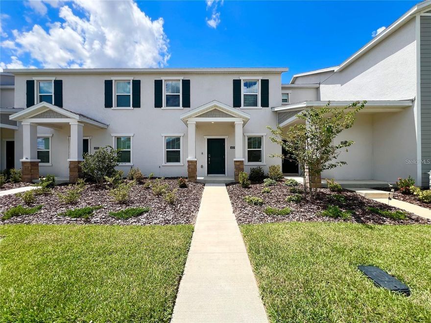 Townhome for SALE in the desirable community of Wellness Ridge! This community emphasizes the importance of a healthy and active lifestyle with all of its luxury amenities including Sports Courts, Clubhouse, Fitness Center, Conservation Areas, Playground, Resort Style Swimming Pool, Tennis, Basketball and Pickle ball courts along with beautiful Multi-Use Trails! This magnificent townhome has two stories and includes three bedrooms, two and one-half bathrooms and a two-car rear load garage. Front door opens onto the spacious open concept combination living room and dining room. There is also a laundry room with washer and dryer and a fully equipped kitchen that leads to a covered patio. The spacious upstairs master suite has a private bathroom and a great size walk-in closet. This home includes stainless steel appliances, quartz countertops, blinds, as well as home automation features such as keyless door locks and video doorbells. The community is close to Lake Louisa State Park with activities such as hiking, camping, fishing, and kayaking. Pick blueberries, fruit and vegetables at Southern Hill Farms. Close to major roadways and theme parks. Contact us to view this home today!