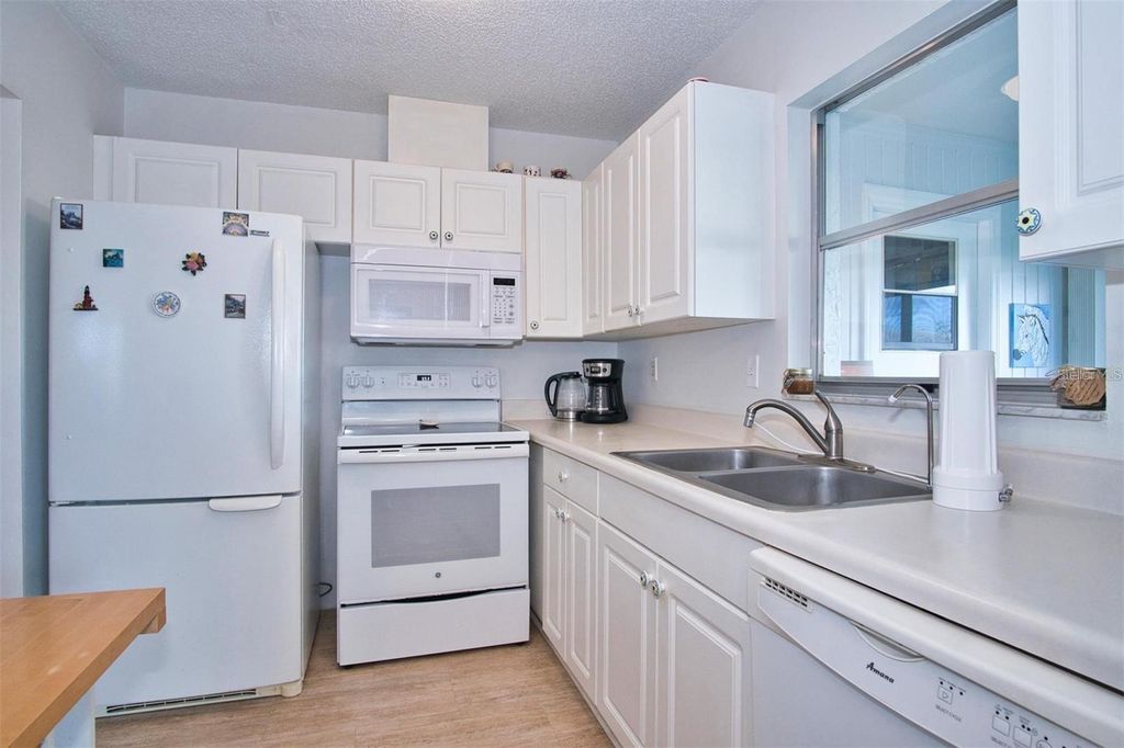 Photo of 1906 Canterbury Lane #32, Sun City Center, FL 33573 (MLS # TB8436008)