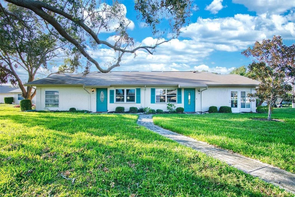 Photo of 1906 Canterbury Lane #32, Sun City Center, FL 33573 (MLS # TB8436008)