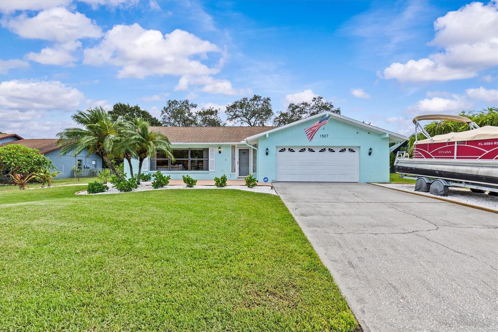 Welcome to this beautifully maintained 3-bedroom, 2-bath home with a 2-car garage, ideally located in the heart of Tarpon Springs.
Sitting on just over a quarter acre, this property offers lush landscaping, a spacious backyard, and a partially fenced backyard with plenty of room for a large pool—perfect for entertaining or unwinding in your private outdoor retreat.
Step inside to discover a light and airy open-concept layout featuring an updated kitchen and bathrooms, stylish finishes, and the convenience of an indoor laundry room. The master suite is spacious with an ensuite bathroom and an "office" or sitting area off the primary bedroom with sliders leading out to the screened lanai. The family room has a built in bar like area to enjoy and also store extra party items. The kitchen overlooks the family room which allows for the cook to interact with the family while preparing meals. It's finishings include white cabinetry, granite counter tops, and stainless steel appliances. Notable upgrades include a newer roof (2016), A/C (2012), water heater (2022), upgraded windows, newer exterior paint and beautiful real wood flooring—all providing comfort and peace of mind for years to come.
Best of all, there’s no flood insurance required and no deed restrictions.
Located just minutes from Fred Howard Park Beach, Sunset Beach, top-rated schools, parks, and the charming downtown district of Tarpon Springs—including the famous Sponge Docks, known for their Greek heritage, unique shops, and delicious bakeries—this home truly offers the best of Florida living.
Don’t miss your chance to make this stunning property yours—schedule your private showing today!