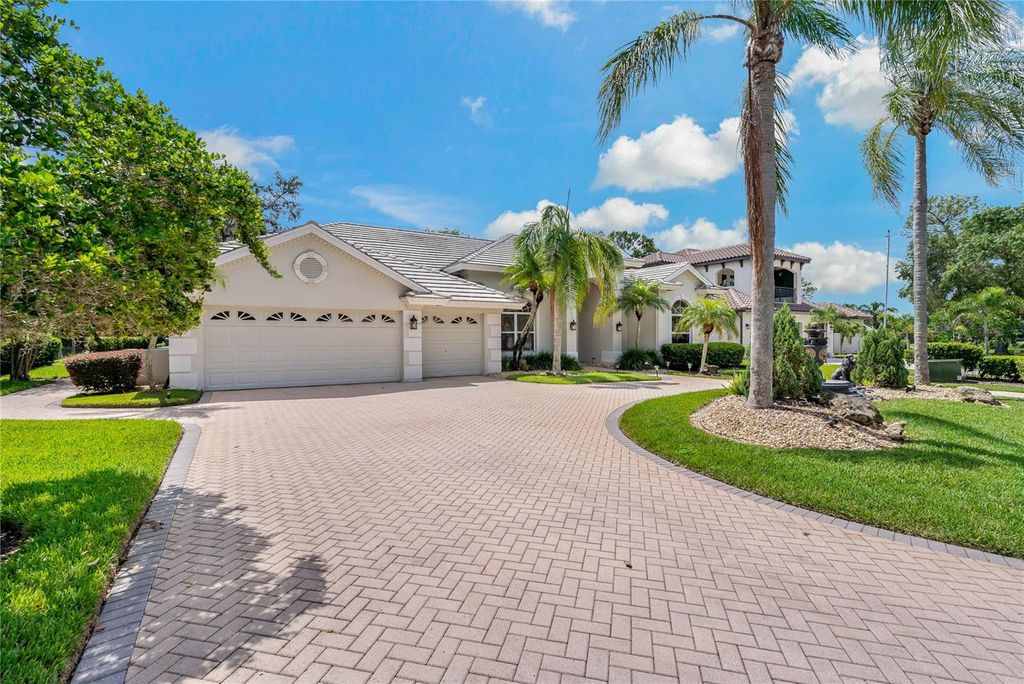 Photo of 5406 Blue Heron Lane, Wesley Chapel, FL 33543 (MLS # TB8408617)