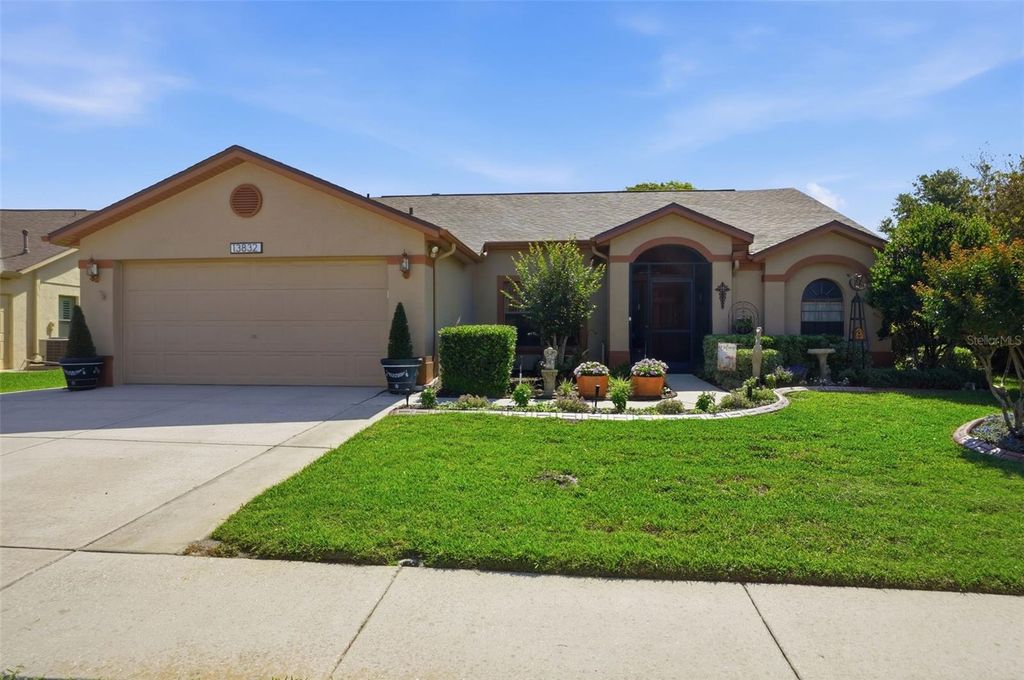 Photo of 13832 Stoneridge Drive, Hudson, FL 34669 (MLS # TB8501697)