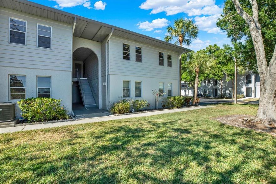This is a must see 2 Bedroom 2 Bathroom Ground Floor Condo. You will wake up in the morning and view the beautiful pond through your Master Bedroom windows, and your guest bedroom as well. Go to your screened in porch sit down and watch the ducks waddle by on their way to eat breakfast. Enjoy your updated kitchen with updated cabinetry and granite countertops. Updated luxury vinyl flooring throughout, along with updated bathrooms (both guest and master bathrooms). You can always go swimming in the community pool or heated jacuzzi. The newly remodeled clubhouse has a sports room with a pool table and ping pong table. On the other side of the clubhouse is your well-maintained laundry room. You can go swim in the community pool and do your laundry, walk your dog in the dog park, play ping pong or pool. Come see it while it's still on the market! Condo association is well vested. Everything is well maintained. No worries. And your Condo Fee Includes: cable TV, community pool, escrow reserves fund, insurance, exterior maintenance, grounds maintenance, pest control, pool maintenance, sewer, trash, water. Centrally located right off of US Highway 19