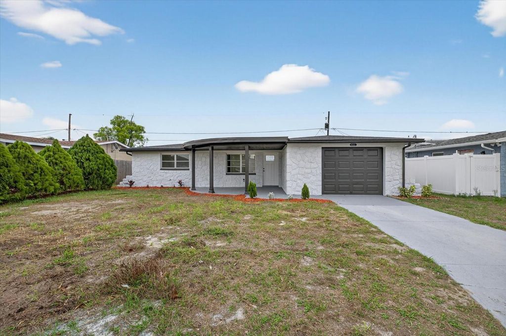 Photo of 3838 Cherrywood Drive, Holiday, FL 34691 (MLS # TB8487498)