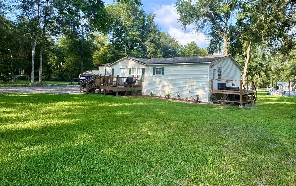 Photo of 5080 Cedar Lane, Brooksville, FL 34601 (MLS # TB8534142)