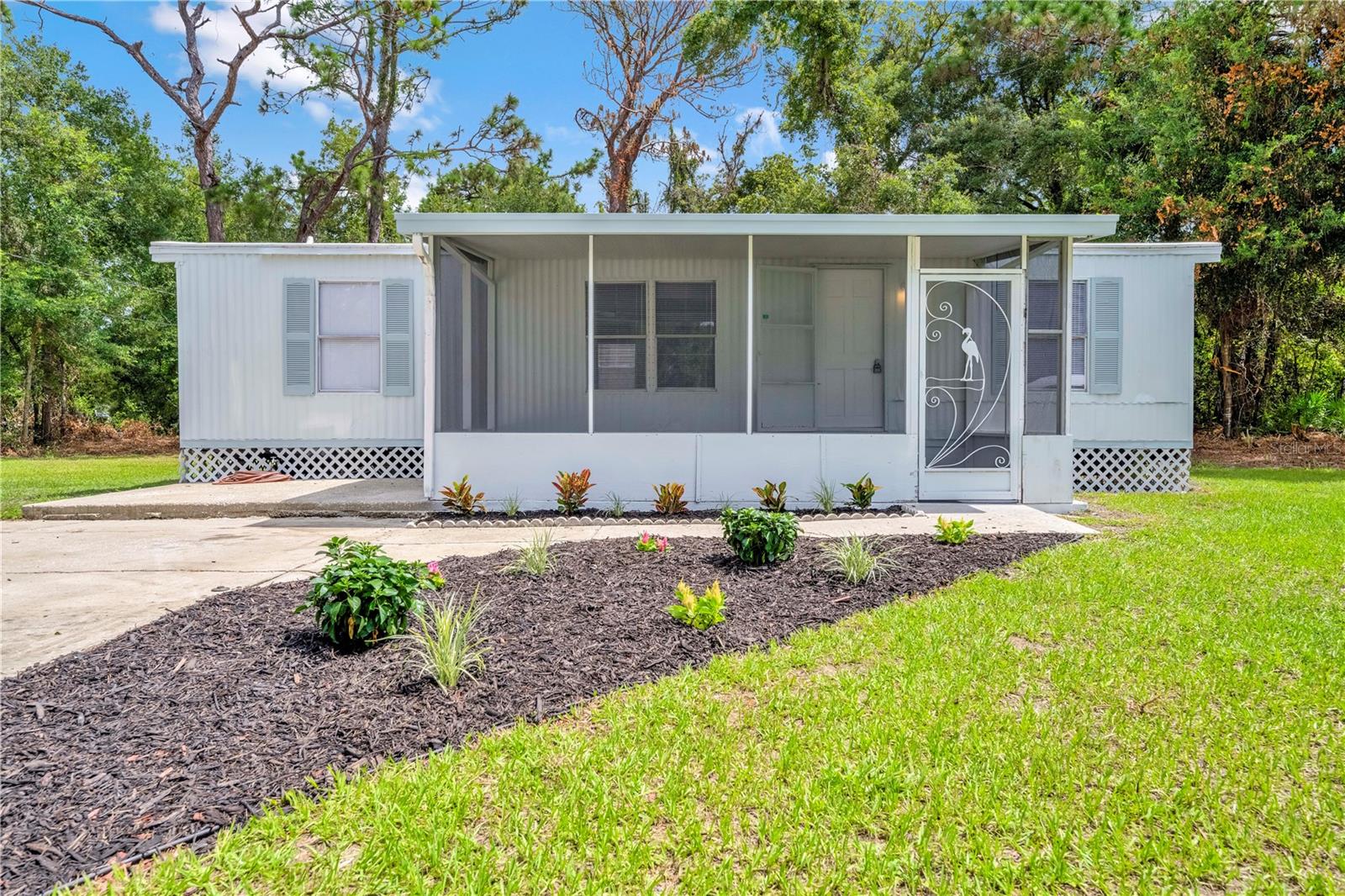 Experience affordable living in the heart of Florida’s Nature Coast with this beautifully renovated 3-bedroom, 2-bath mobile home in Crystal River. Inside, enjoy a bright open layout, a modern kitchen with new cabinetry and appliances, updated baths, and fresh finishes throughout. Discover affordable Florida living in this charming 3-bedroom, 2-bath mobile home tucked away in Crystal River. This home welcomes you with beautiful front landscaping and a screened-in front porch — the perfect spot to sip sweet tea, enjoy the evening breeze, and watch the world go by. Conveniently located near shopping, dining, and the area’s famous springs, this property blends comfort with a relaxed lifestyle. Whether you’re looking to settle down or scale back, this home delivers the space you need and the Florida charm you’ve been searching for — all at a budget-friendly price. Schedule your private showing today!!