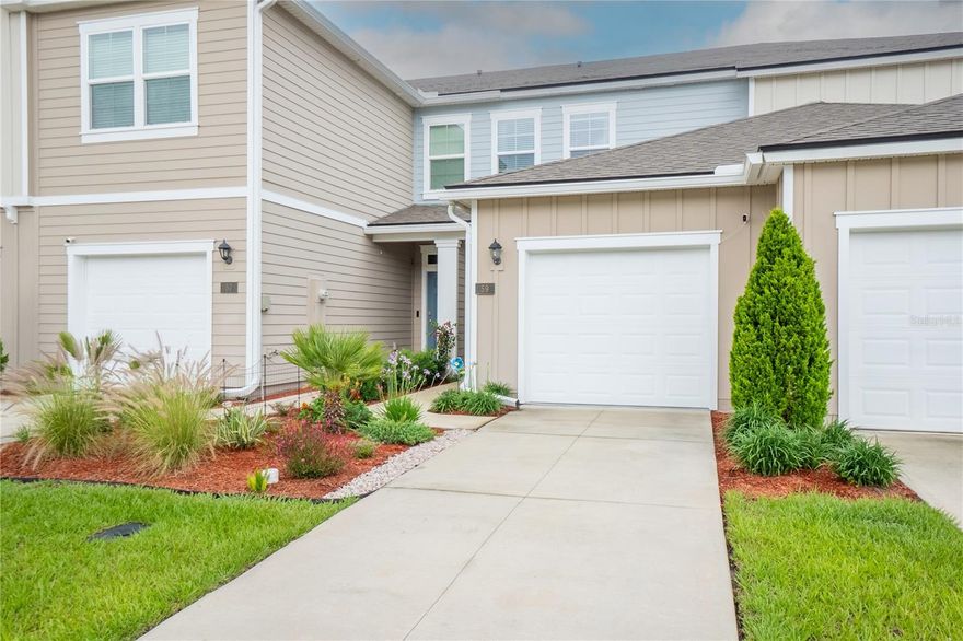 Built in 2023, this beautiful 2-bedroom, 2.5-bath townhome is located in the gated community of The Trails at Belle Terre. Thoughtfully upgraded throughout, the home features a stylish marble backsplash in the kitchen, new carpet on the stairs and second floor, and a finished garage with painted walls and epoxy-coated floors. Additional upgrades include rain gutters and an incredible custom-built closet in the primary bedroom.
Both bedrooms are located upstairs and each has its own private bathroom, offering an ideal and private layout.
The location is hard to beat—approximately 20 minutes to the beach, 10 minutes to shopping and restaurants, 5 minutes to I-95, and minutes from Belle Terre Elementary School and Indian Trails Middle School.
Don’t miss the opportunity to own this move-in-ready, upgraded townhome in a fantastic community!