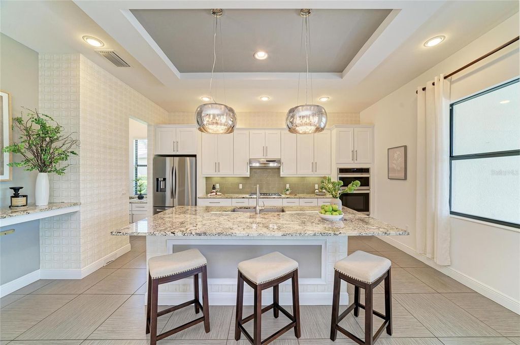 Photo of 826 Honeyflower Loop, Bradenton, FL 34212 (MLS # A4685391)