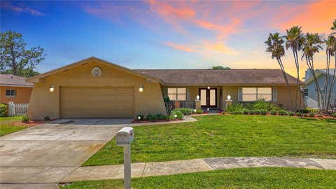 Photo of 6490 Burning Tree Drive, Seminole, FL 33777 (MLS # TB8505437)