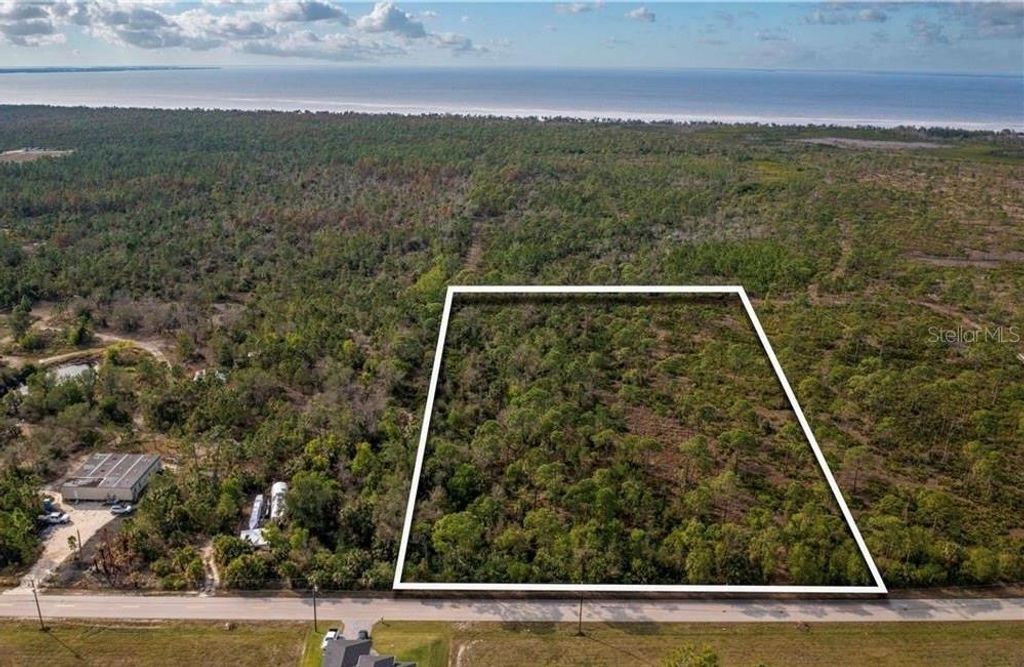 Photo of 4170 Old Burnt Store Rd, Cape Coral, FL 33993 (MLS # C7526132)