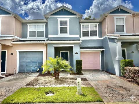Photo of 823 Pine Pointe Ln, Orlando, FL 32828 (MLS # O6412459)