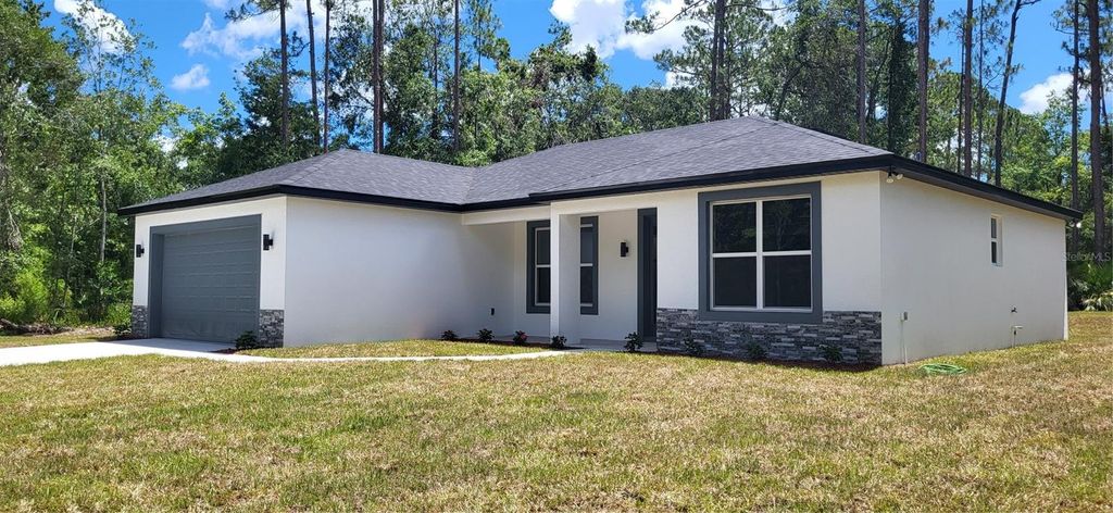 Photo of 1665 Rosewood Street, Bunnell, FL 32110 (MLS # O6368955)