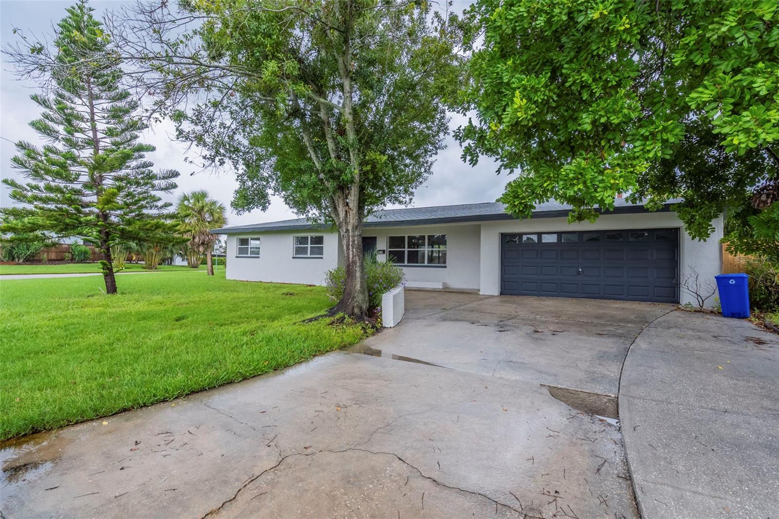 A gem in Shore Acres with a pool! Come take a look at this beautifully renovated 4-bedroom, 2-bath home features fresh paint, new flooring, and an open kitchen with updated cabinets and stainless steel appliances, offering a modern and inviting space ready to enjoy. Perfect home for entertaining friends and family with an in-ground pool, screened lanai and fully fenced backyard. Home located near Shore Acres Rec Center, multiple parks and public boat ramps and all that the City of St Petersburg has to offer!