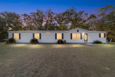 Photo of 11922 NW 197th Terrace, Alachua, FL 32615 (MLS # GC536305)