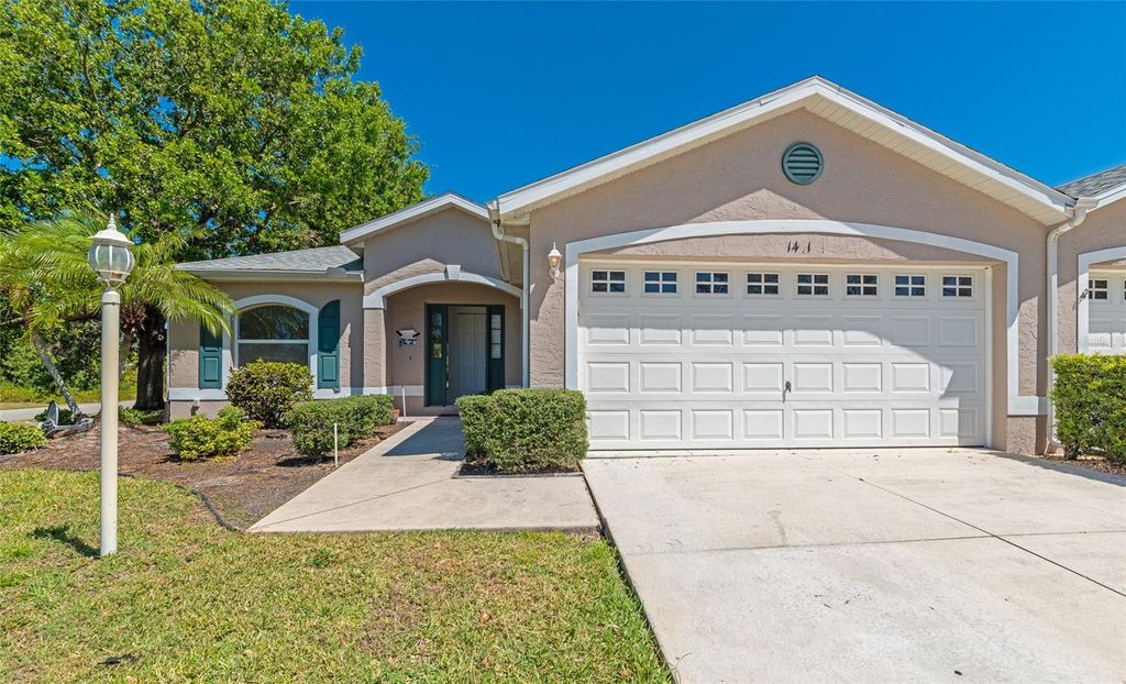 Photo of 1401 Hedgewood Circle, North Port, FL 34288 (MLS # A4690499)