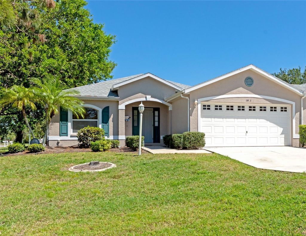 Photo of 1401 Hedgewood Circle, North Port, FL 34288 (MLS # A4690499)
