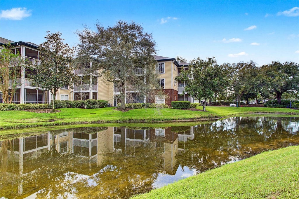 Photo of 4211 Chatham Oak Court #111, Tampa, FL 33624 (MLS # TB8558461)
