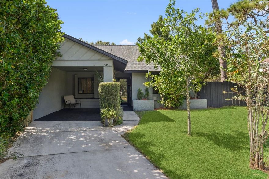 Welcome Home to 5450 Serene Lane! A well-maintained 3-bedroom, 2-bath duplex offering comfort, privacy, and a convenient location near Orlando. This home features tile flooring throughout, a split-bedroom floor plan, and an indoor laundry room. The kitchen is beautifully appointed with a black granite sink, tiled backsplash, and butcher block wood countertops. Bedroom 2 includes a barn door entry and wet bar, providing a unique and versatile space. Enjoy the outdoors in the screened and covered lanai or relax in the fenced backyard with additional patio seating. There’s also extra storage in the rear and a 1-car carport for convenience. The property backs to city-owned green space with no rear neighbors and a peaceful setting. Located in a quiet community with no HOA, this home offers both tranquility and accessibility—just a short drive to Orlando, shopping, dining, and major highways. Ideal for homeowners or investors seeking a low-maintenance property in a desirable Central Florida location.