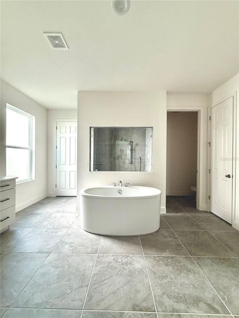 Tiny photo for 394 Switchgrass Loop, Minneola, FL 34715 (MLS # TB8436760)