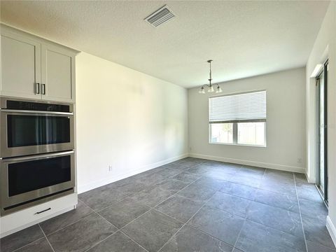 Tiny photo for 394 Switchgrass Loop, Minneola, FL 34715 (MLS # TB8436760)