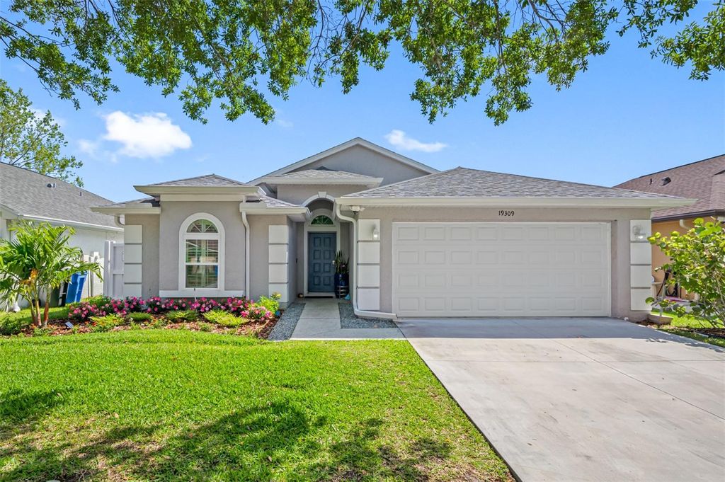 Photo of 19309 Garden Quilt Circle, Lutz, FL 33558 (MLS # TB8391806)