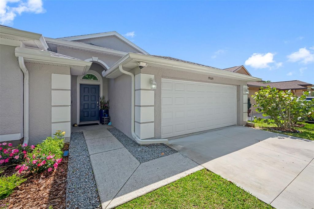 Photo of 19309 Garden Quilt Circle, Lutz, FL 33558 (MLS # TB8391806)