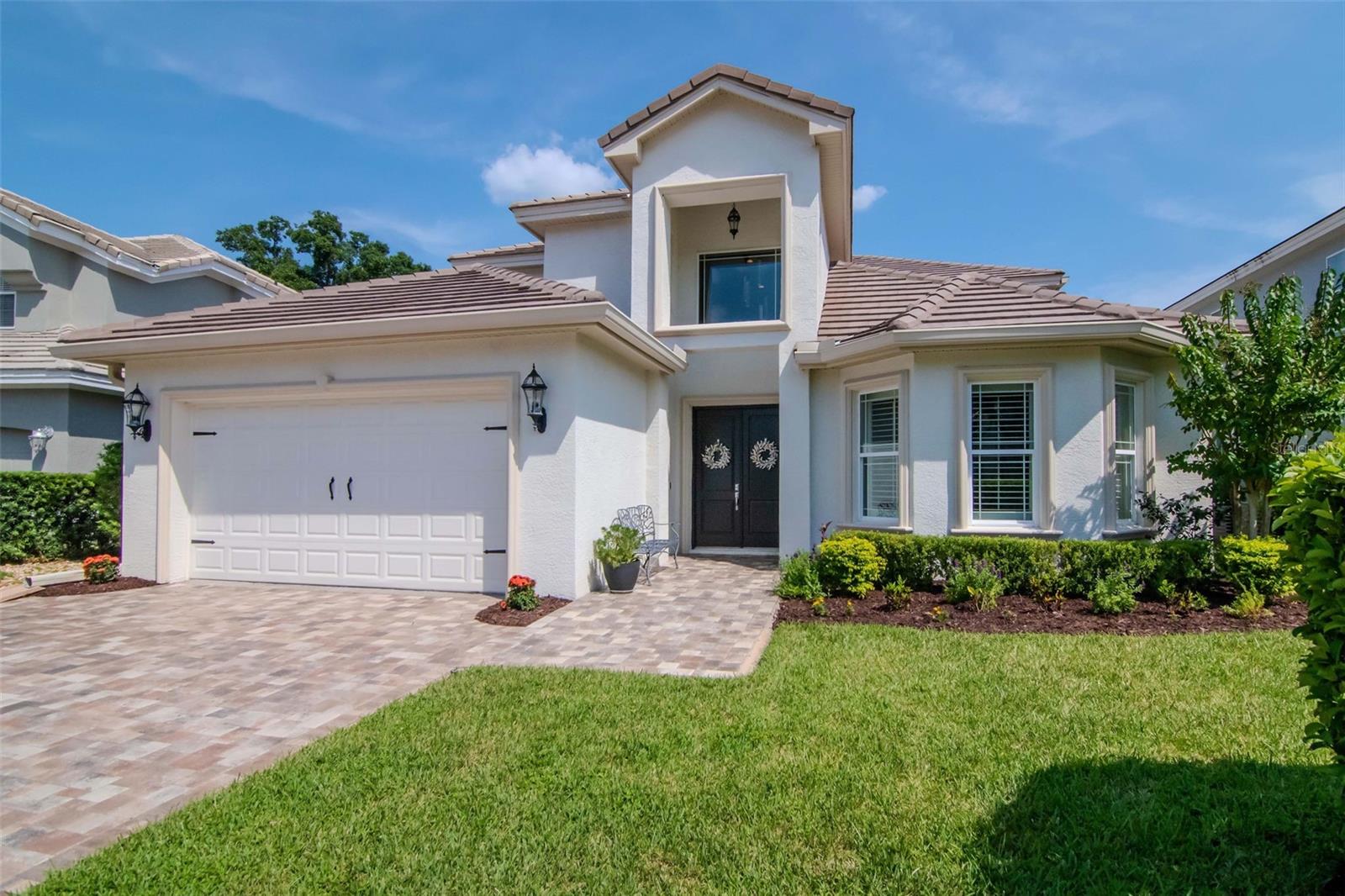 We are pleased to present this STUNNING, 2015 BUILT, 3 bedrooms, a study and plus bonus room, 3-1/2 bath, 3,634 sq. ft. home in Cheval! This model-like property features a light and bright open floor plan with volume ceilings; a SPECTACULAR KITCHEN with 42" custom cabinetry, granite countertops, stainless steel appliances, new 5-burner island gas cooktop (2021), double ovens, drawer microwave and walk in pantry; spacious bedrooms (MAIN FLOOR PRIMARY BEDROOM); a BEAUTIFUL PRIMARY BATHROOM with large shower (dual shower
heads), freestanding garden tub and dual master closets; all secondary full baths with custom cabinetry and granite countertops; MAIN FLOOR ALL TRAVERTINE and WOOD-PATTERNED TILE on second floor; tray ceilings; PLANTATION SHUTTERS and ELEGANT CROWN MOLDING throughout; 5-1/2 inch baseboard throughout; gas fireplace; a HEATED SALT WATER POOL with brick paver decking and newly re-screened enclosure (heat pump pool heater installed 2020, new salt cell 2021, new variable-speed pool pump 2023); 2 HVAC systems and tankless hot water heater; security system; laundry room with custom cabinetry and sink; large closets that provide great storage; oversized 2 car garage with epoxy floor finish (2019) and overhead storage racks; a brick paver driveway (2020),
walkway and porch and much more! Cheval has 3 convenient entry gates, all of which are staffed 24 hours a day, seven days a week. Cheval also offers easy access to the newly renovated Cheval Golf Club and Athletic Center and the new Cheval golf course opening in
November, and to the adjoining TPC Club. Add to these GREAT SCHOOLS, a community park/playground and a convenient location for shopping and interstate travel and you have a fantastic place to call Home.
Enhanced energy efficiency and quietness with new (November 2024) HVHZ (Miami-Dade)
impact French doors with internal shades and blackout drapes going from master bedroom
to pool.
Other energy improvements include changing all ceiling fans to new remote-control fans
with LED lights, upgrading almost all light fixtures throughout the house to LED, installing a
new variable-speed Energy Star rated pool pump, improving attic insulation to R38,
installing radiant barrier, and adding R30 insulation over garage.
As a precaution against potential prolonged power outages without worrying about the
availability of gasoline, installed a generator inlet port with manual interlock (connects
generator to circuit breaker panel) and an extended natural gas line to connect the included
portable tri-fuel generator capable of powering most critical electrical equipment.